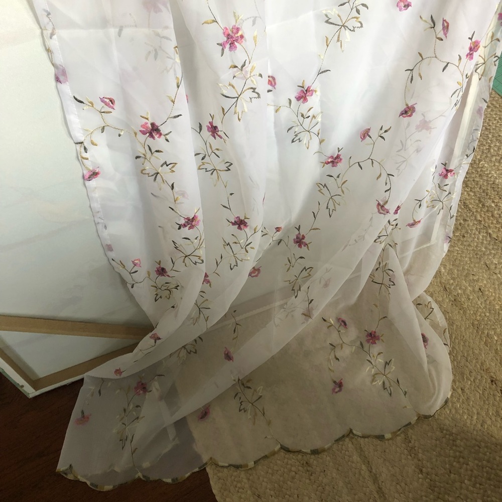Sheer embroidered curtain panels